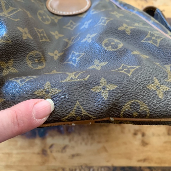 Louis Vuitton duffle bag with exterior pockets - Picture 14 of 16